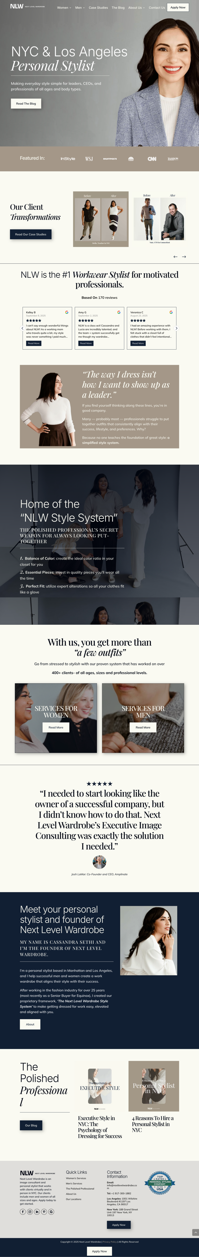 laptop on a table next to a cup of milky coffee