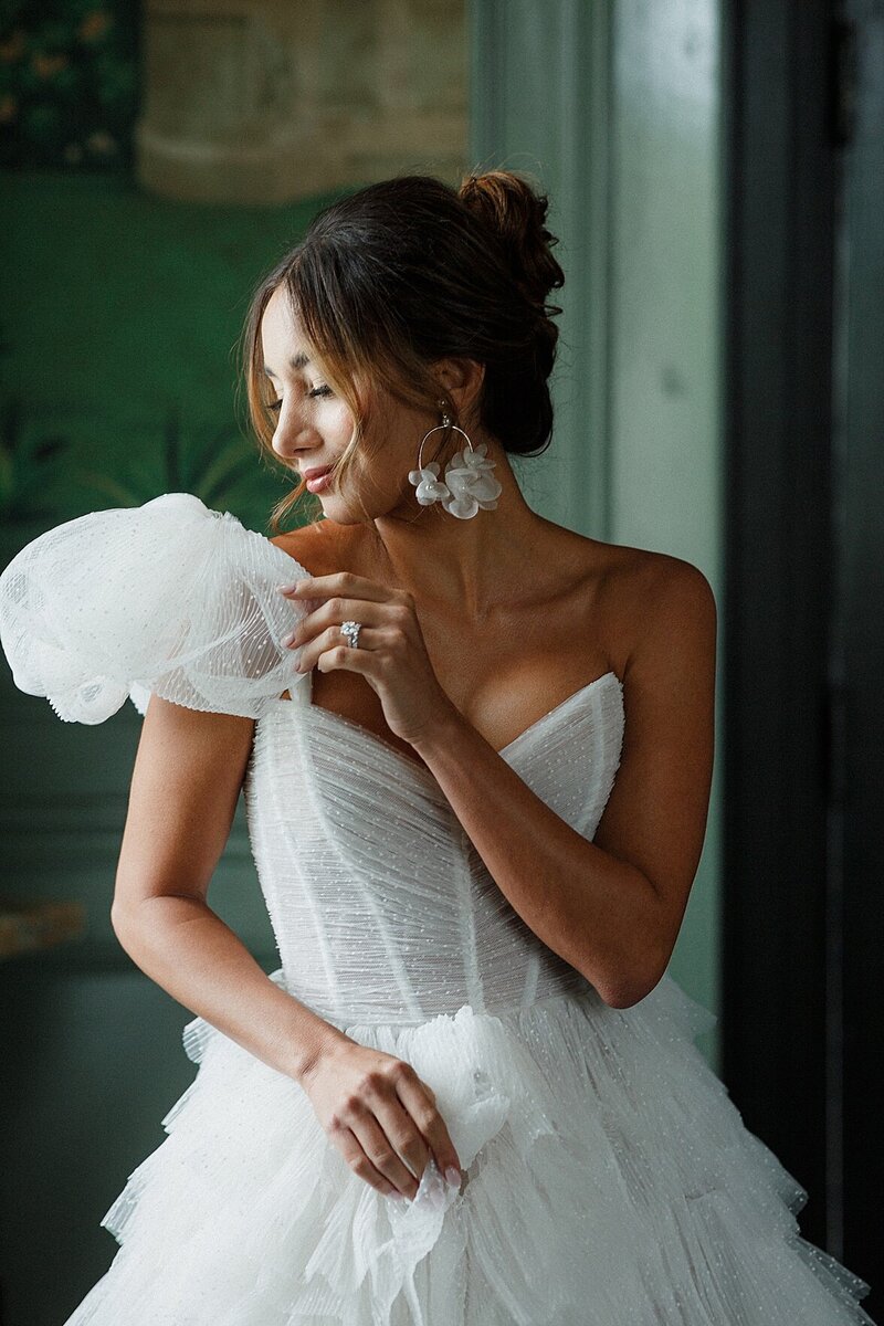 Bride wearing  a  Monique Lhuillier