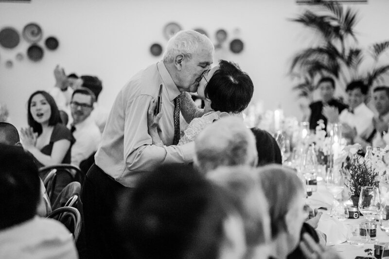 kiss during a wedding party in Italy