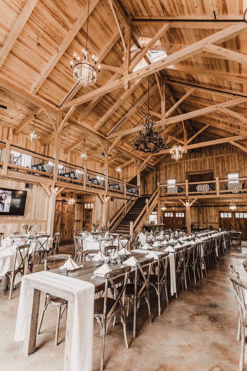 rustic barn wedding venue reception set up