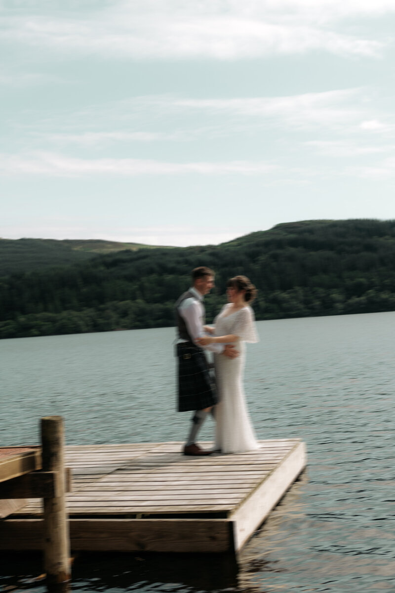 bride and groom in sand dunes