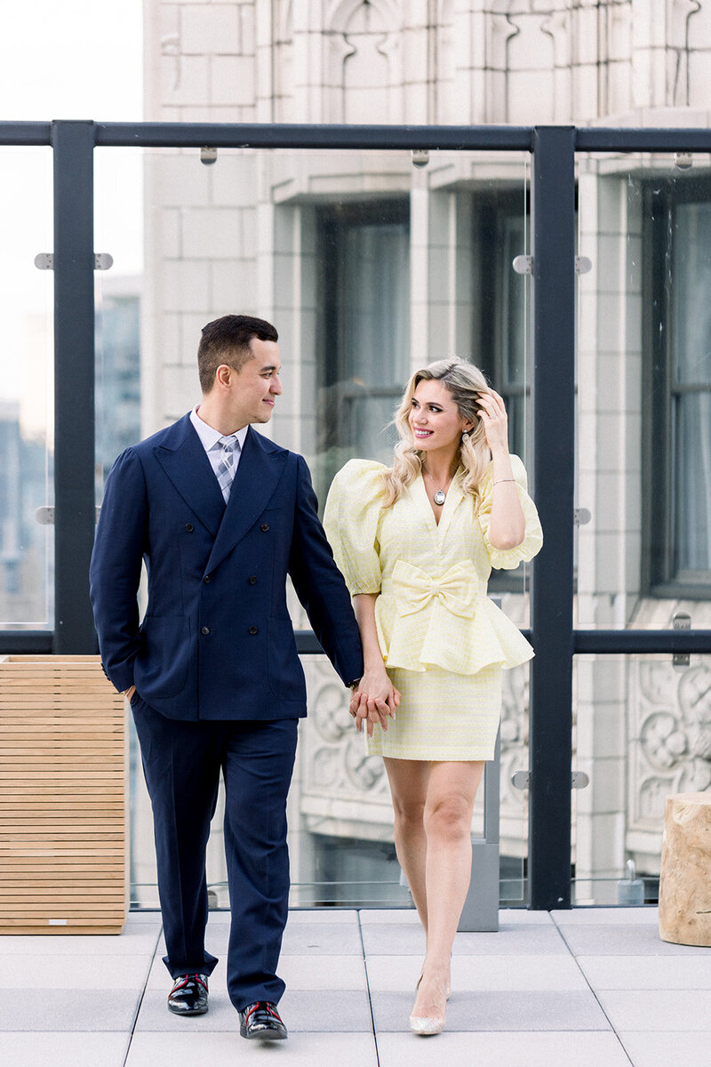 engaged couple on chicago rooftop