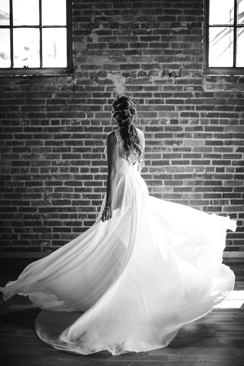 twirling flowy wedding dress by Knoxville Wedding Photographer, Amanda May Photos