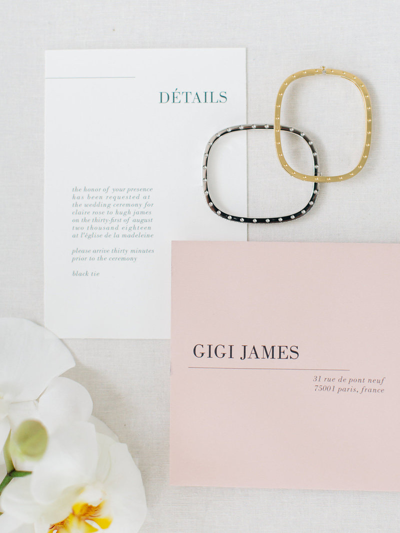 This is a minimalist wedding invitation suite with a chic parisian feel