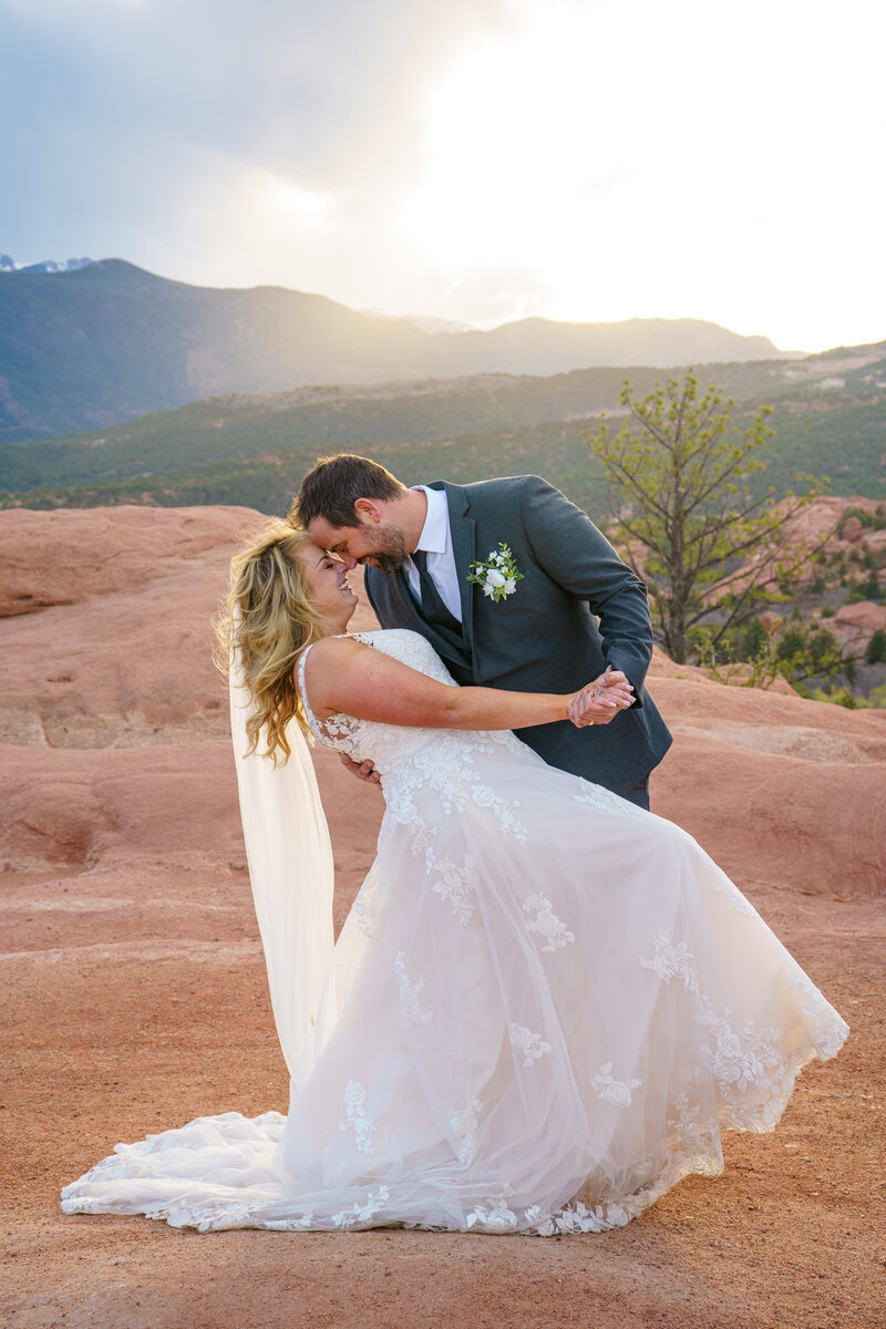 Intimate elopement ceremony set against Colorado's iconic red rock formations, captured by a Colorado elopement photographer