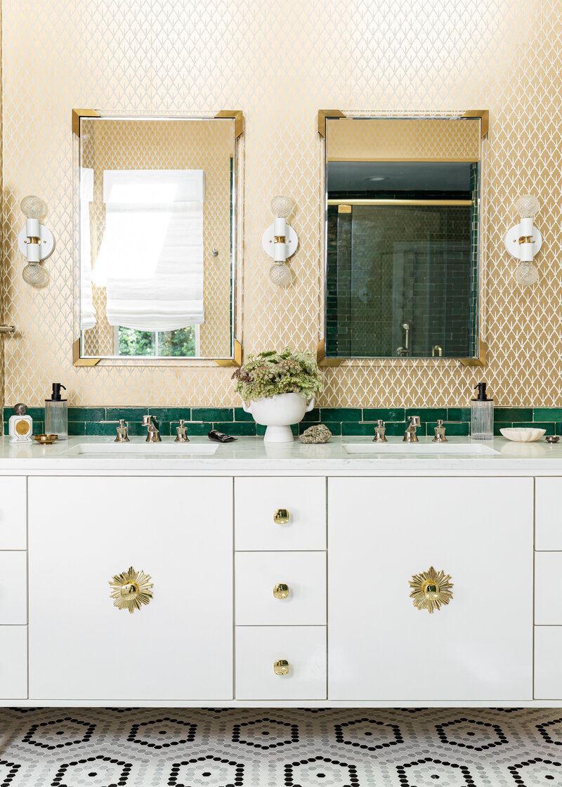 Primary Master Bathroom with Schumacher burnished gilt mugheal leaf wallpaper, emerald green Zellige 2”x6” tile, and black and white hexagon floor tile.