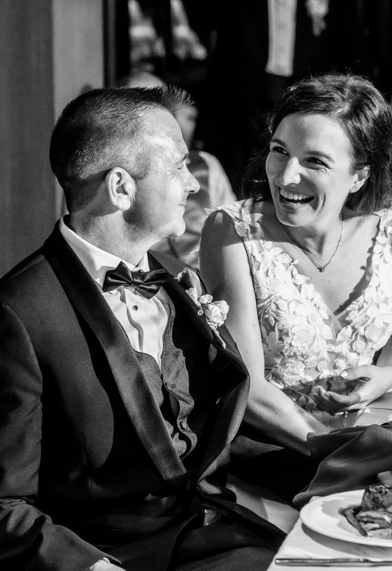Bride laughs during reception speech at Annapolis Yaght Club, Maryland Wedding