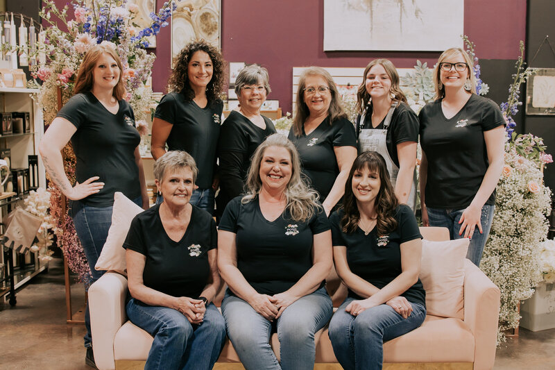 Staff members of The Posie Shoppe in black shirts