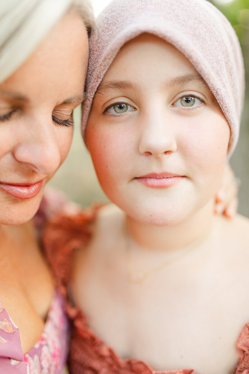A mother and daughter hugging sweetly and gently during a family photo session in Lexington KY.