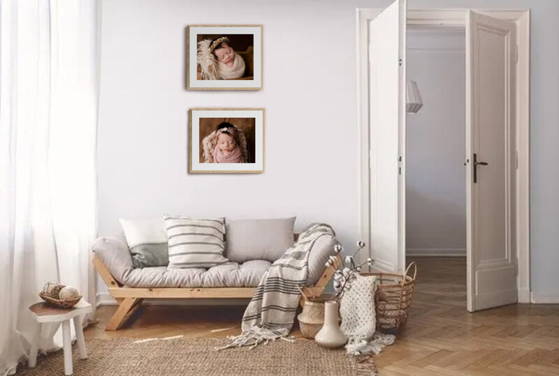 two framed art pieces with brown frame to match the sitting room with brown couch and tan pillows