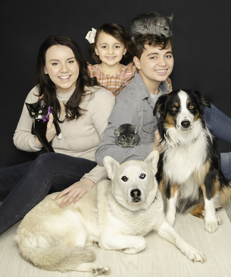 Meet the Creative Mind Behind Ashlie Steinau Photography - A Portrait of Motherhood, Love, and Connection. Explore this Heartfelt Image of Ashlie's Children and Beloved Pets, Reflecting Her Passion for Capturing Genuine Moments.