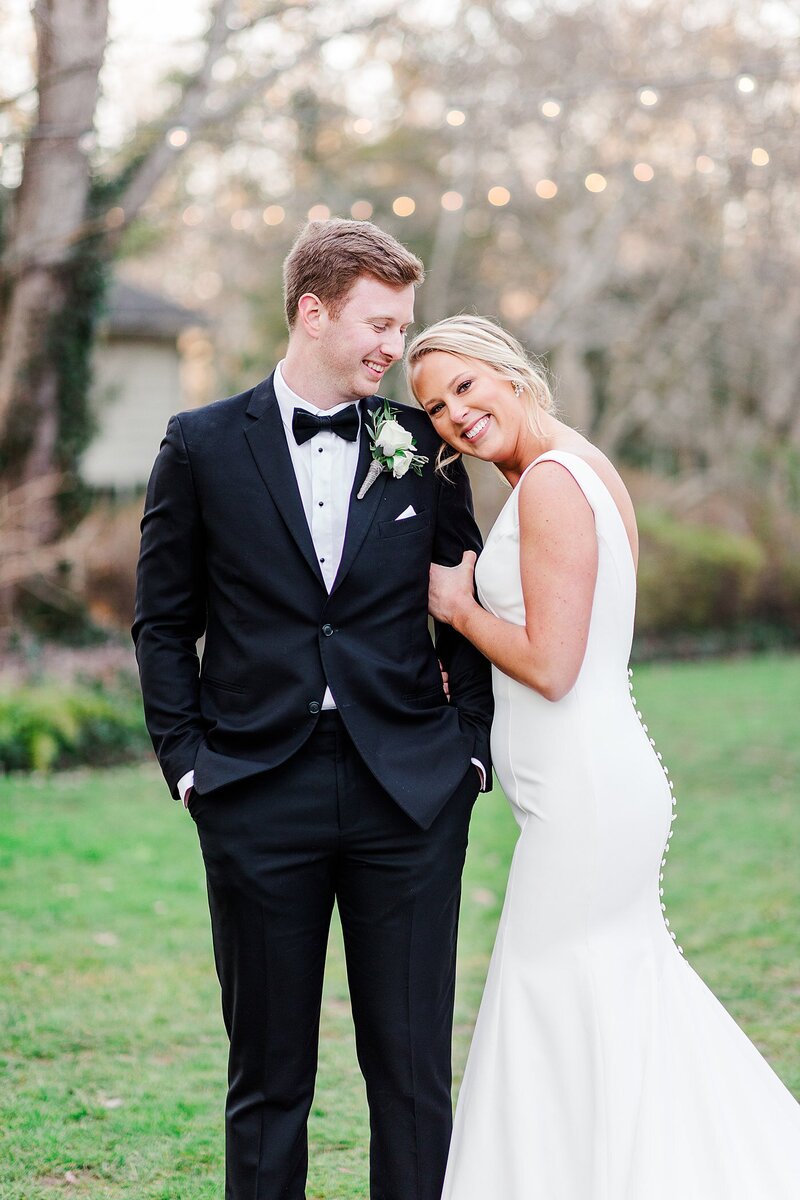 bride resting head on groom's shoulder by Knoxville Wedding Photographer, Amanda May Photos