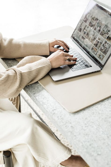 Interior design consultation discovery call with client browsing design inspiration on laptop.