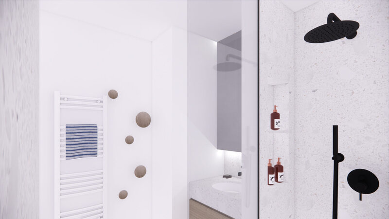 compacte badkamer met zwarte kranen en nis in de douche