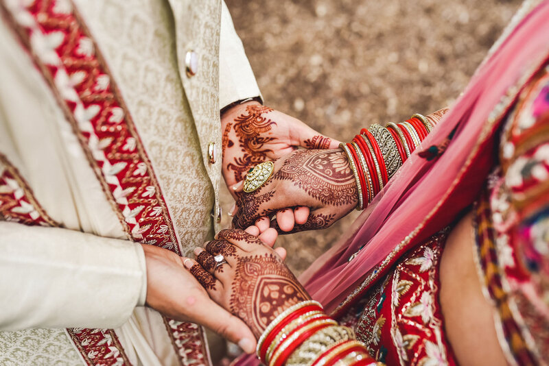Indian ceremony holding hands