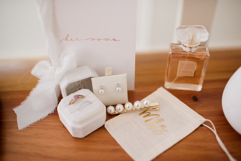 Bride's wedding ring, accessories and perfume