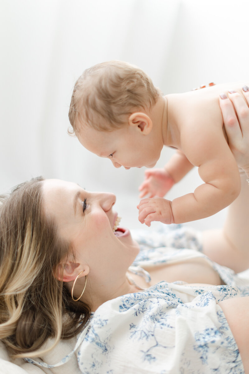 Mother smiles at her baby
