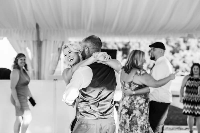 First Dance of bride and groom as bride laughs at Browns Orchard, PA Wedding