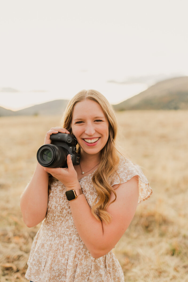 Utah Wedding Photographer Robin Kunzler smiles for a self portrait branding photo