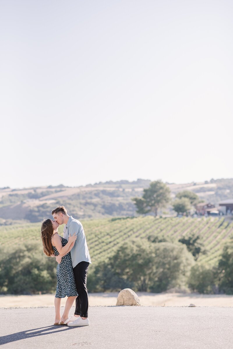 Photo of couple kissing after getting engaged | Paso Roble Proposal