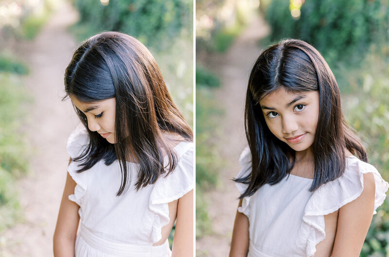 A tween girl wearing a white dress looks away from the camera  during her Los Angeles child portrait session