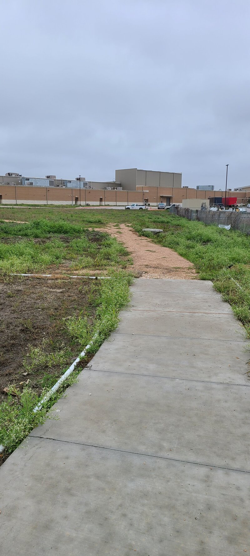Weis HS Tennis Court Sidewalk Before
