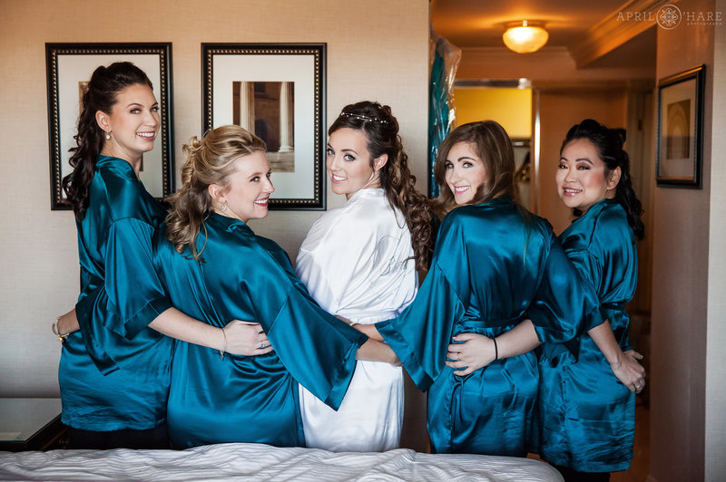 Bride with her bridesmaids in her Warwick Hotel Suite in Denver