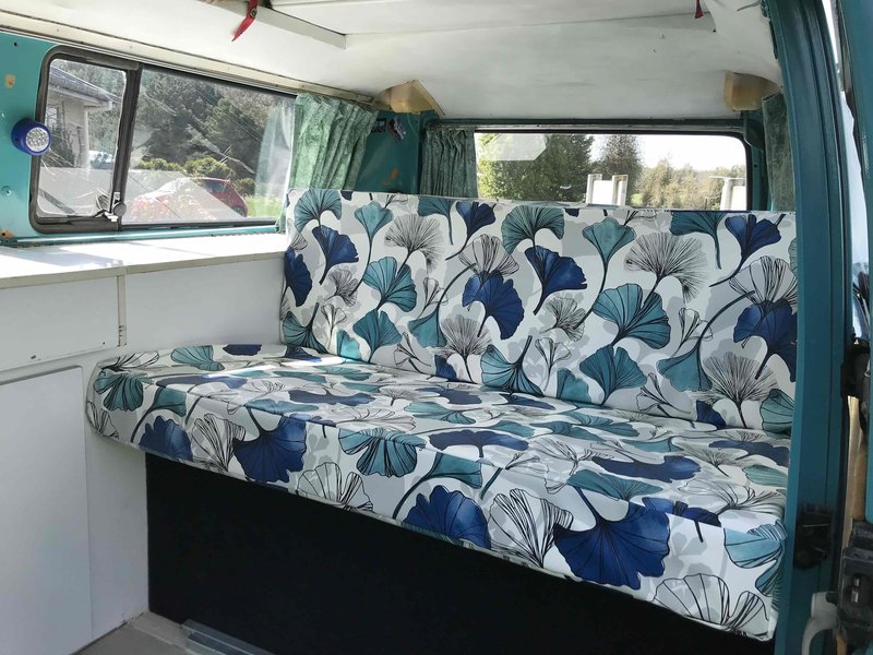 Inside view of seating of Rhonda, teal retro kombi van from NZ Kombi Hire