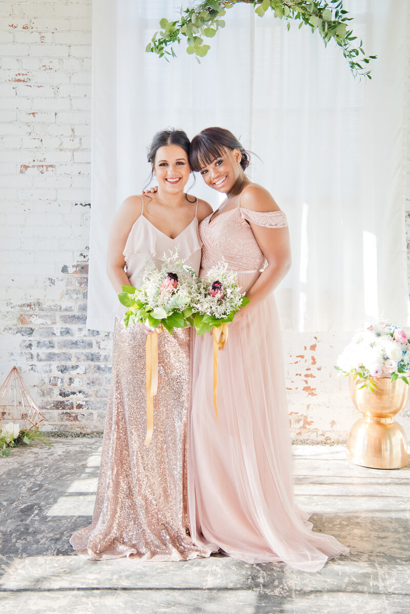 Bridesmaids with sparkling dresses and colorful bouquets in Fort Worth