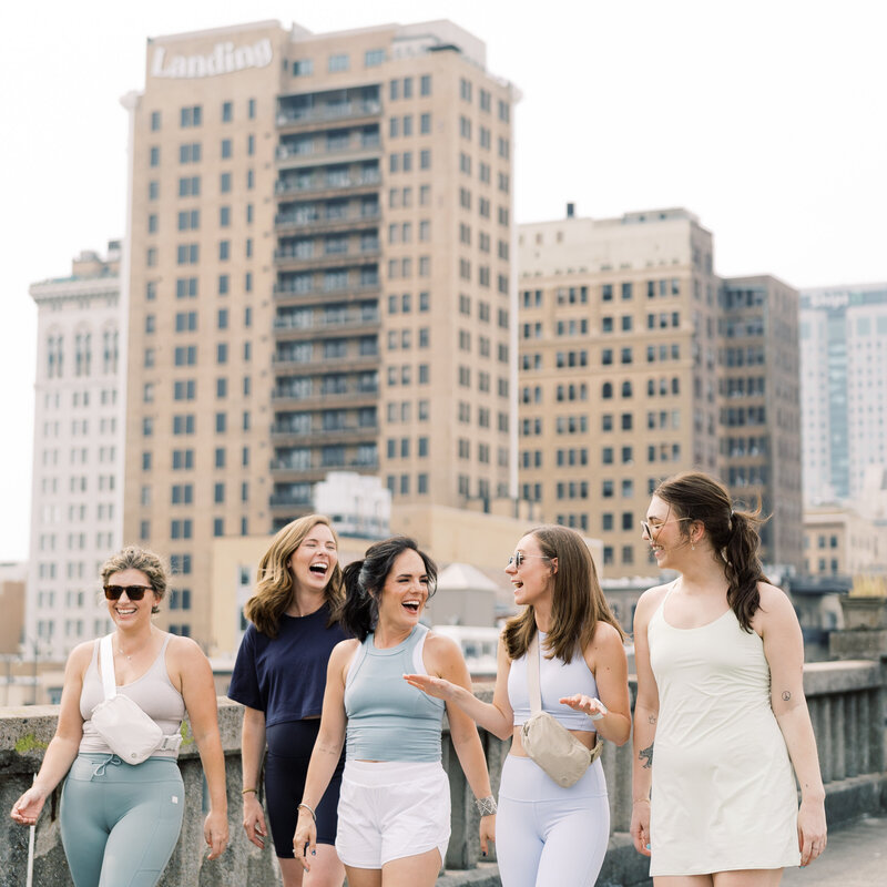 Women smiling walking downtown Birmingham