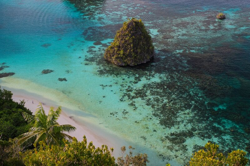 Explore wild forgotten islands and pristine beaches by yacht in Raja Ampat