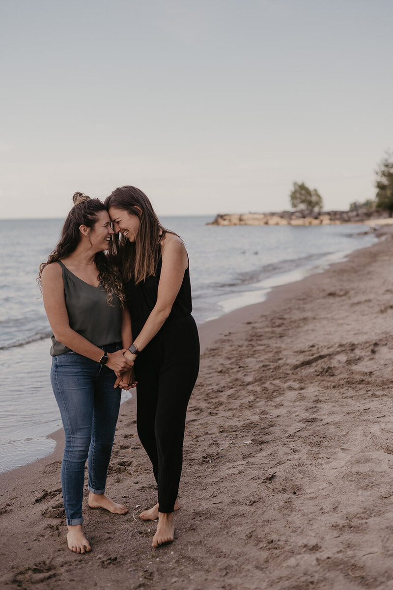 beach engagement session for two brides