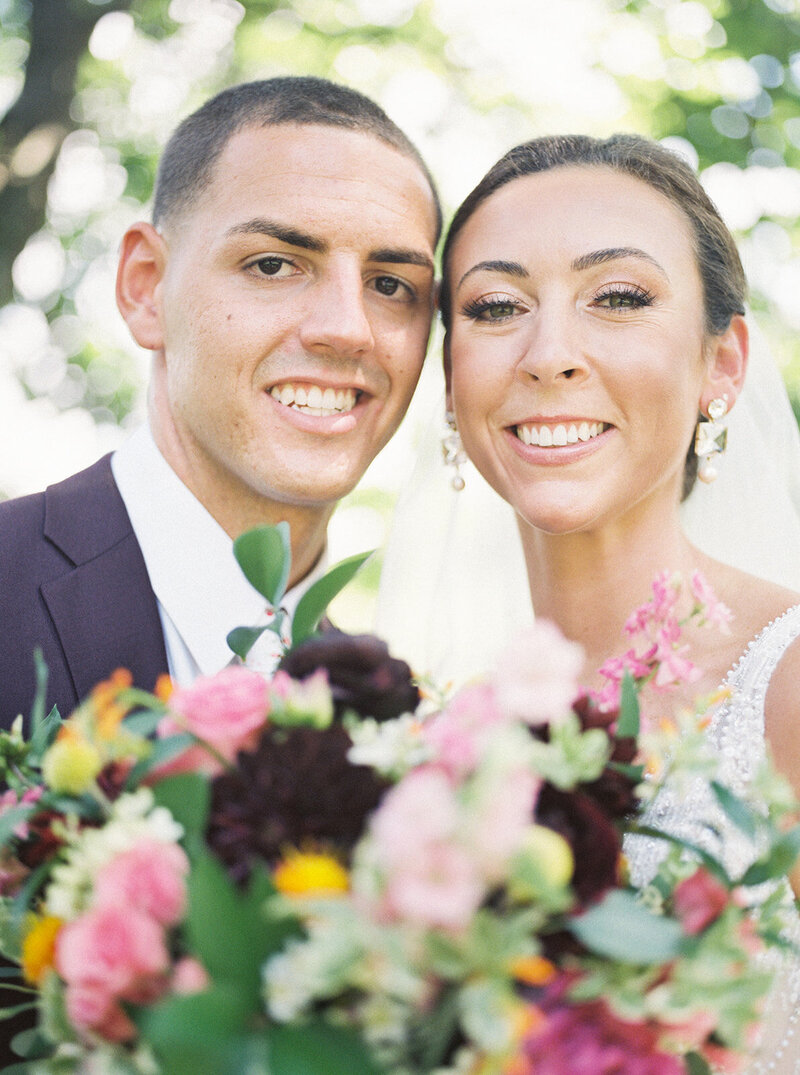 Colorful bouquet by Crossed Keys Designs and Crossed Keys Estate joyful newlywed moments captured by NJ Wedding Photographers | Michelle Behre Photography