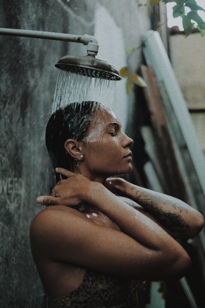 Woman in Shower deregulating nervous system