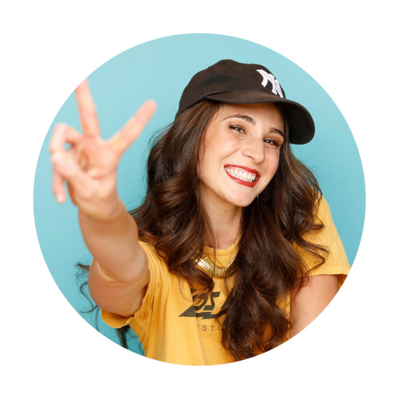 Actress posing with baseball cap
