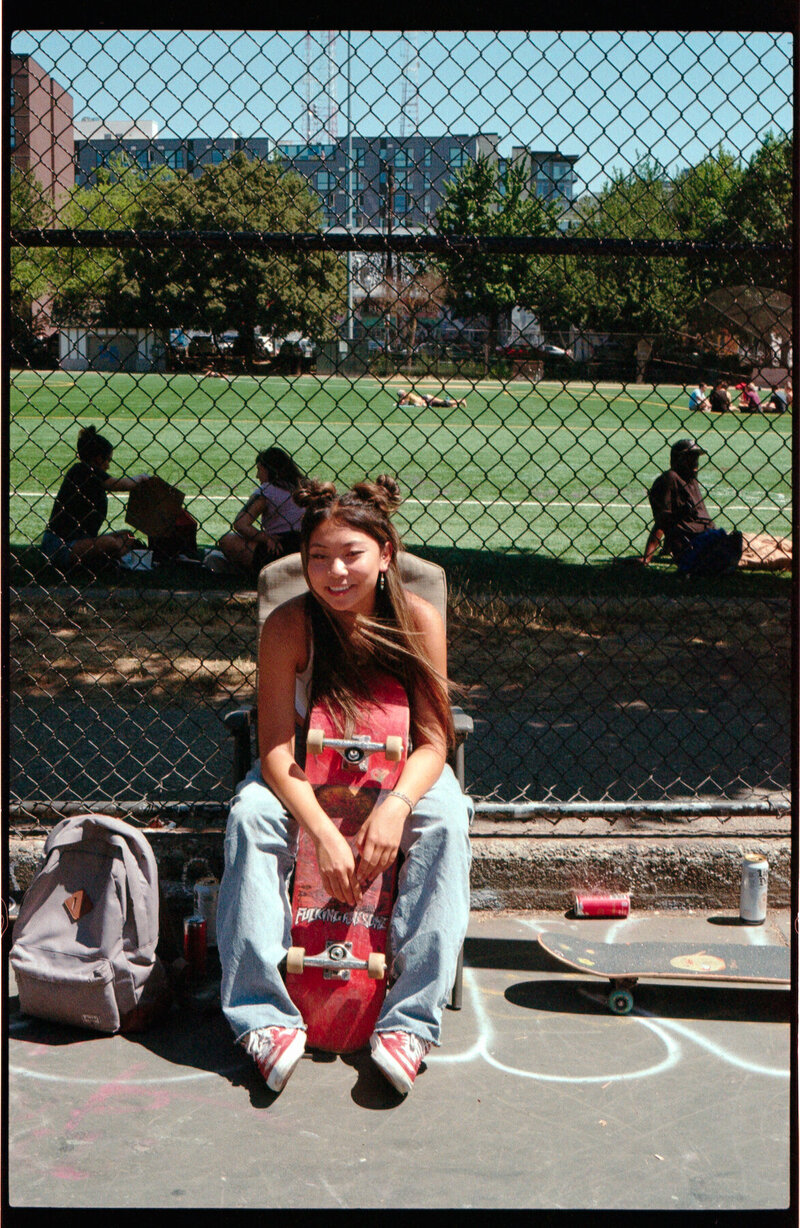 Young girl with her skate board in Seattle skate park