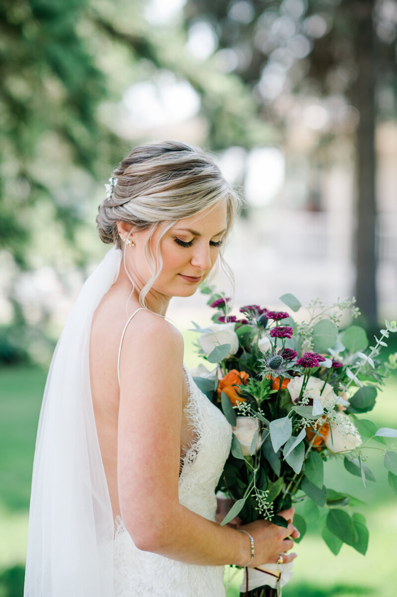 A stunning Minnesota bride and her bouquet