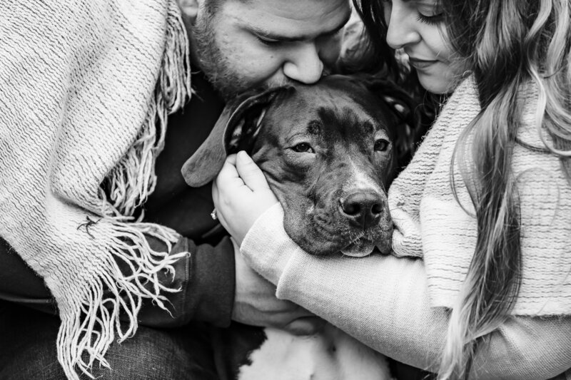Black and white photo couple with Dog