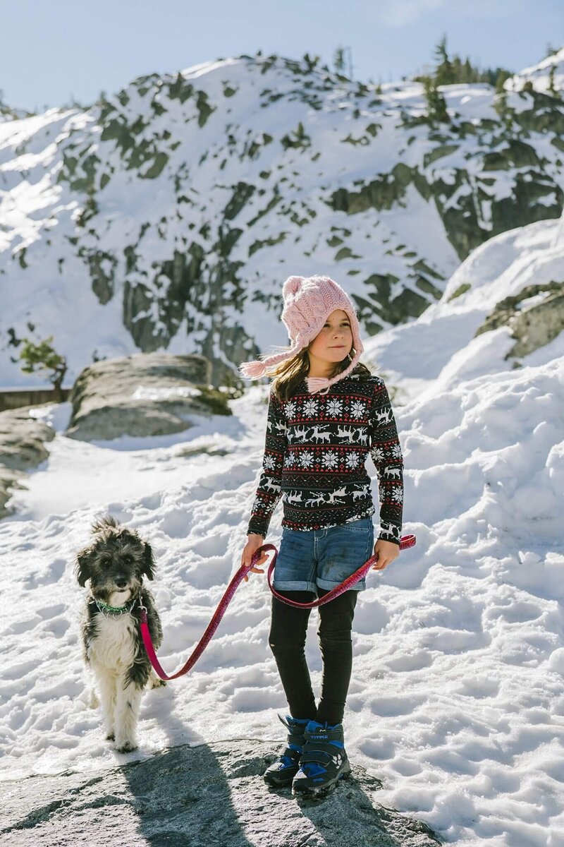 Donner Summit family portrait in snow with dog during winter