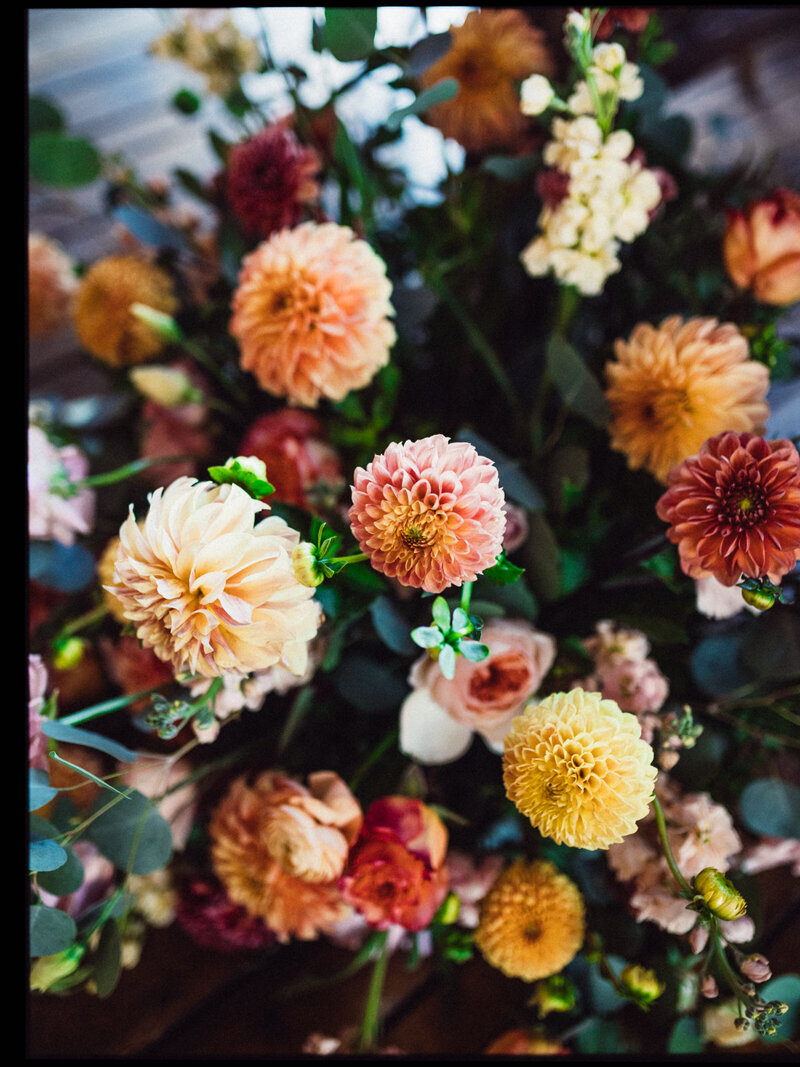 Bride and groom walk hand in hand through the woods at South Carolina Wedding Venue Waverly Place.
