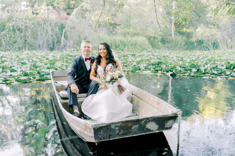 wedding venue with a man made lake where the couple took photos