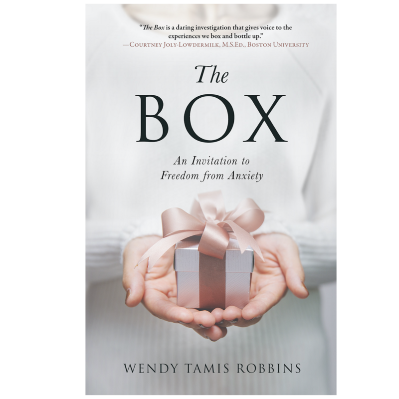 Cover of The Box book with woman's hands holding a small box with pink ribbon
