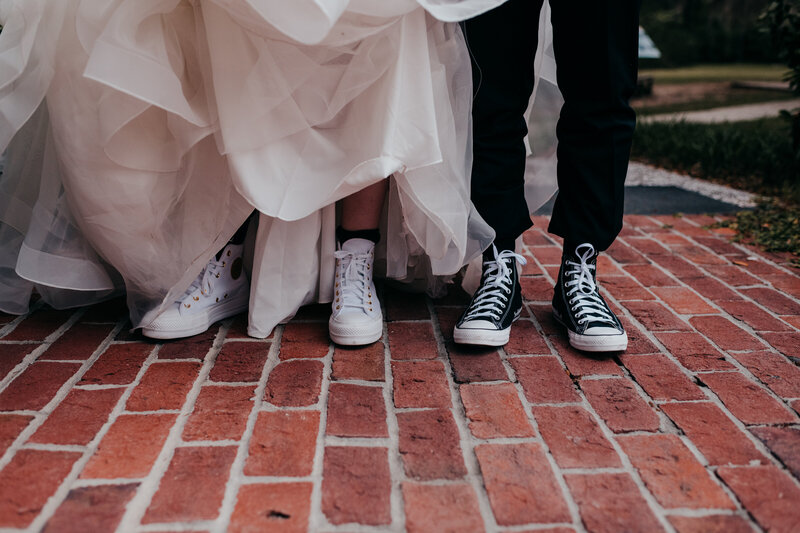bride and groom shoes shot