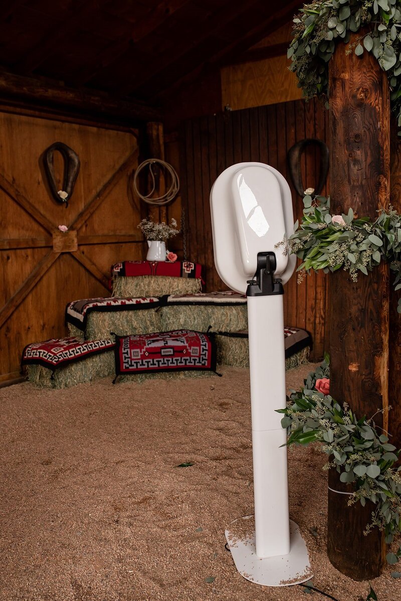 A photo booth in a barn