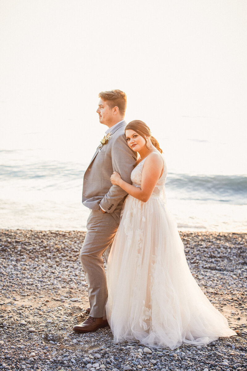 bride and groom photos at beach at camp kintail at sunset