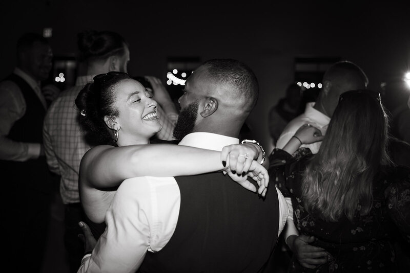 black and white photo of couple on wedding dance floor