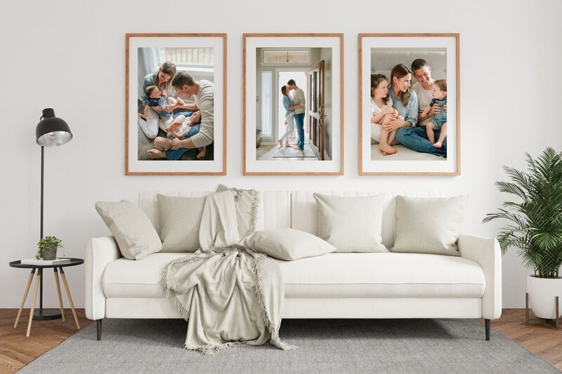 Beautiful wall gallery of 3 framed photos in a modern living room. Photographs taken by San Antonio family photographer Cassey Golden.