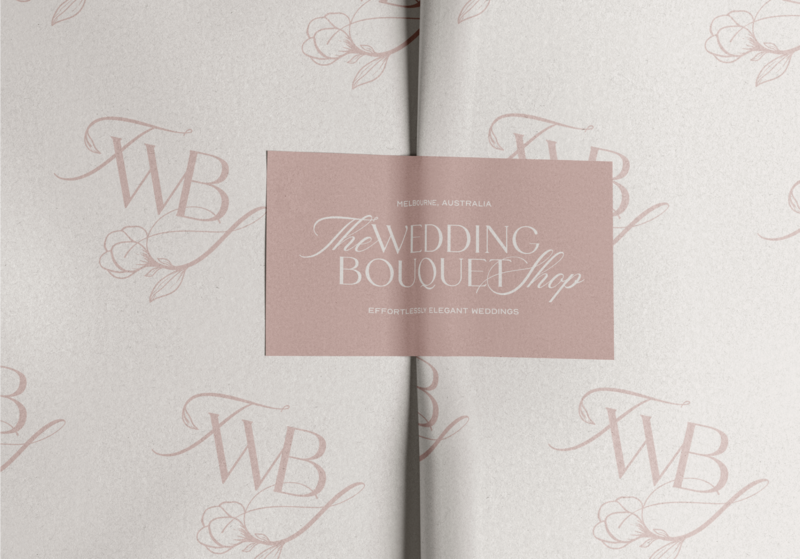 Elegant brand identity logo mockups on tissue paper for The Wedding Bouquet shop by Knoxville brand agency Liberty Type