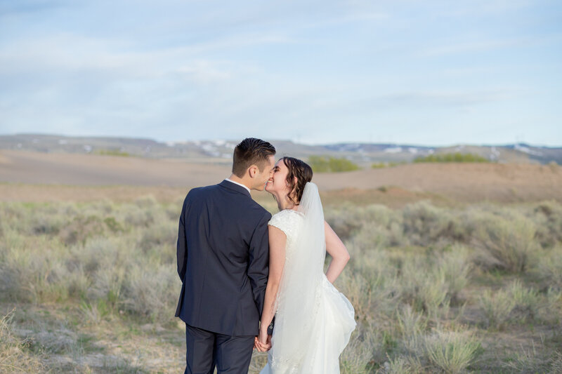 Seattle Wedding Photographer captures bride and groom kissing during Washington wedding