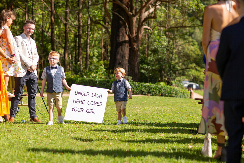 Two ring bearer funny signs